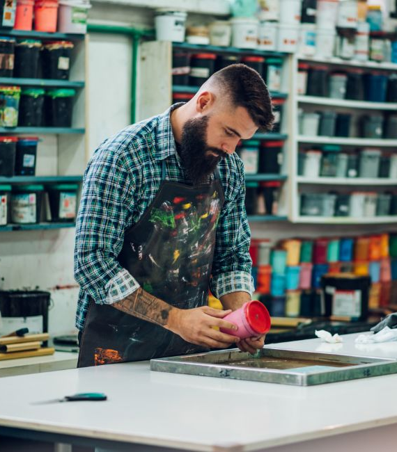 Selerant EHS compliance and SDS authoring man in paint shop mixing