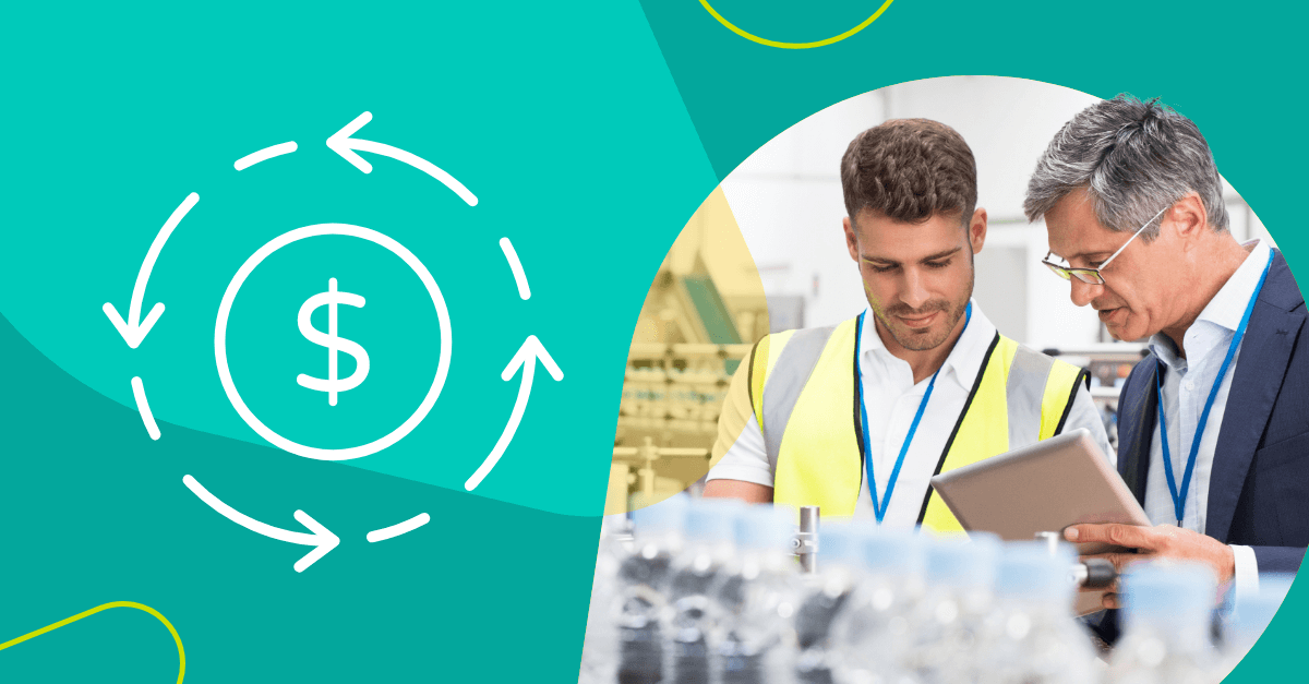 Two workers reviewing specifications at a beverage manufacturing plant